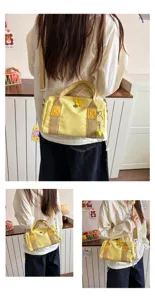 Lässige Canvas Umhängetasche für Kinder, stilvolle gelbe Reise-Handtasche mit Gurt.