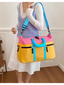 Dopamine colorblock travel duffel bag for women, large capacity gym and sports shoulder bag.
