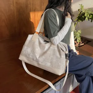 Large capacity women canvas travel duffel bag weekend overnight bag with shoulder strap main view
