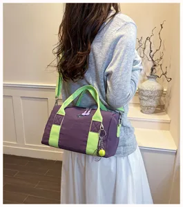 Stilvolle lila grüne Canvas Reisetasche tragbare Outdoor Handtasche für Kinder Alltag.