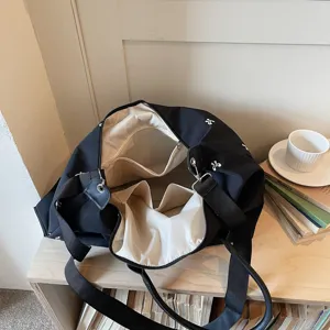 Borsa da viaggio nera con ricamo floreale, borsa sportiva multifunzionale con tasche multiple.