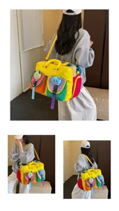 Detailed view of colorful multi-pocket travel duffel bag with cute plush charms and straps.