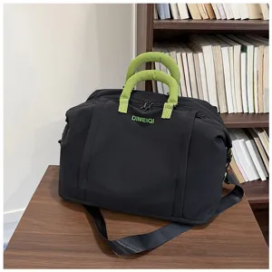 Borsa da viaggio nera con manici verdi, grande capacità, elegante borsa sportiva a tracolla.