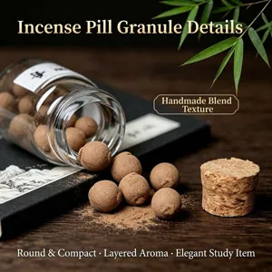 Close-up detail of handcrafted round solid incense pills with glass bottle and cork props.