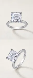 Detailed view of the exquisite princess cut moissanite ring with glistening sparkling stone.
