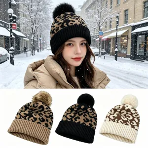 Gorro de punto cálido de invierno para mujer con pompón, elegante gorro con vuelta de leopardo.