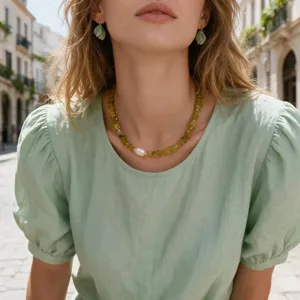 Exquisite green stone chip and pearl necklace detail shot, elegant clavicle chain design for women