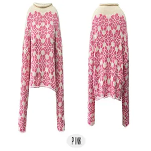 Oversized turtleneck knit sweater with pink floral jacquard pattern and long sleeves.