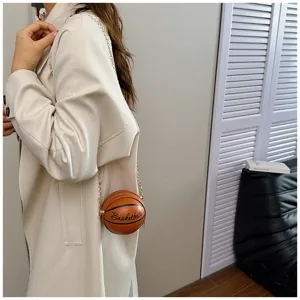 Unique basketball shaped crossbody bag with metal chain strap, stylish trendy PU leather round bag.