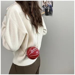 Creative basketball shaped crossbody bag for women, red PU leather round shoulder bag with chain.
