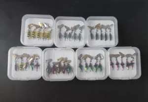 Boxed micro fishing spinner set with fly hooks, perfect for trout and bass fishing enthusiasts.