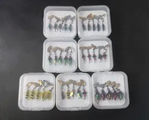 Detailed view of boxed micro fishing lures set featuring transparent boxes with colorful fly hooks.