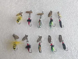 Detailed view of 10 micro fishing lures featuring rotating spinner blades and colorful feathers.