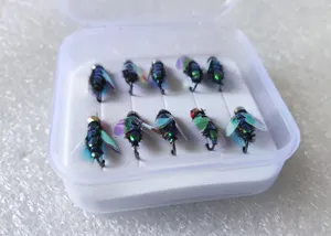 Detailed shot of boxed fly fishing lures set featuring vibrant holographic wings and realistic textured bodies.