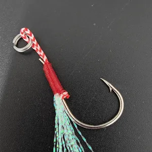 Jigging assist hook with flashy tinsel and split ring for saltwater sea fishing gear.