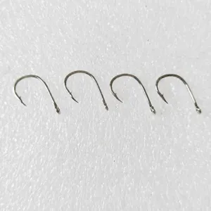 Stainless steel barbed fish hooks with ring eyed design for sea fishing and saltwater angling.