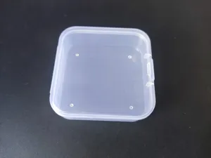 Transparent plastic storage box detail showing the clear square container with secure hinged lid.