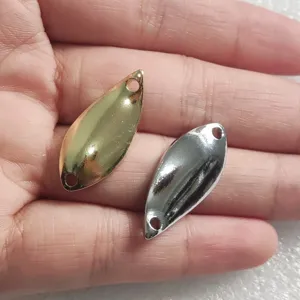 Metal fishing spoon lures for trout and bass, dual color gold and silver metal bait.