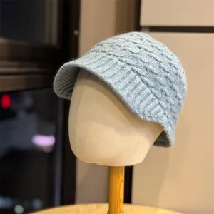 Knit winter hat detail, cozy wool material, stylish brim design, soft daily wear accessory.