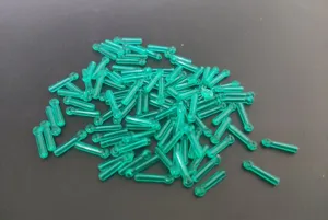 Detailed shot of bulk transparent green silicone fishing float seats accessories parts.