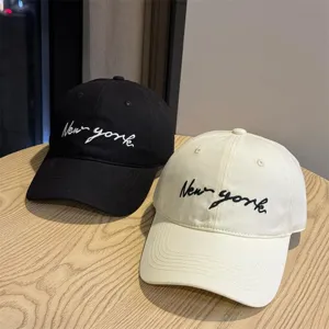 Korean style embroidered baseball cap for women, sun protection sun hat in black and white colors.