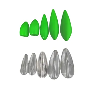 Fishing lure casting float set, transparent and green teardrop sinkers for fly fishing tackle.