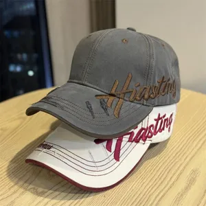 Vintage embroidered baseball cap with wide brim, stylish distressed washed cotton hat for women.