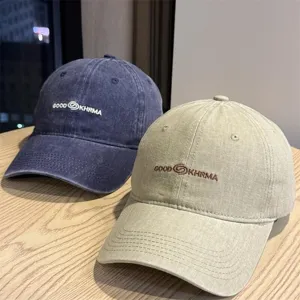 Vintage washed cotton baseball cap for men and women, casual outdoor sun protection hat.