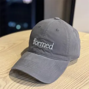 Classic grey baseball hat with white embroidered letter design, stylish and versatile casual cap.