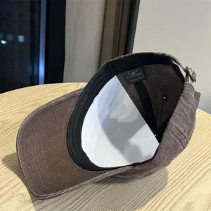 Detailed view of the Korean vintage washed baseball cap showing inner lining and brand tag.