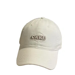 White baseball hat with CARE embroidery, casual dad cap for outdoor sun protection daily wear.