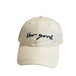 Beige women baseball cap with chic letter embroidery, sun protection and casual daily wear style.