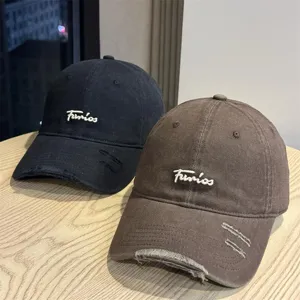 Japanese style distressed baseball cap with white letter embroidery, soft top wide brim.