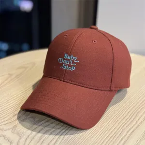 Unisex brown embroidered baseball cap with custom slogan, perfect for autumn casual wear.