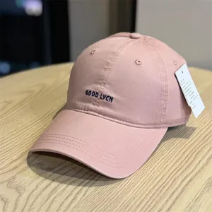 Vintage washed cotton baseball cap for women and men, casual pink duck tongue sun hat.