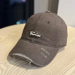 Vintage washed distressed baseball cap for women and men, stylish curved brim hat.