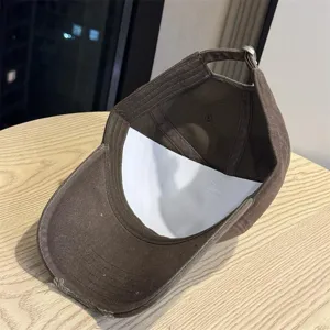Brown distressed baseball cap for women and men, vintage soft top wide brim dad hat.