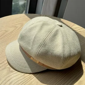 Detailed view of women wool newsboy beret hat, autumn winter chic retro painter hat texture