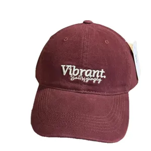 Wine red baseball cap with white embroidered text front view, soft crown casual sun hat.