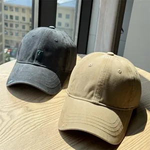 Washed cotton baseball cap for men and women, vintage style with letter embroidery detail.