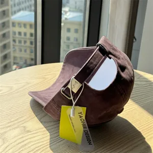 Detailed view of the casual cotton baseball cap showing the adjustable metal buckle and tag.