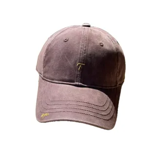 Vintage washed baseball cap with gold embroidery letter, casual dad hat for men and women.
