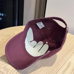 Korean style soft top curved brim baseball cap interior detail showing cotton fabric.