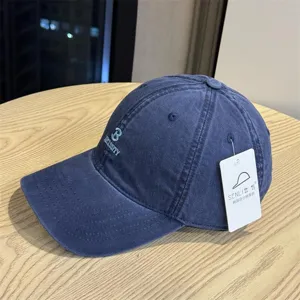 High quality washed denim baseball cap with letter embroidery, versatile design for daily wear.