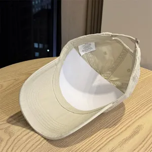 Casual washed cotton baseball cap for men and women, minimalist solid color hat for daily streetwear.