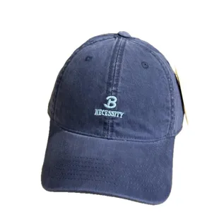 Navy blue embroidered baseball cap for men and women, classic dad hat with curved brim.