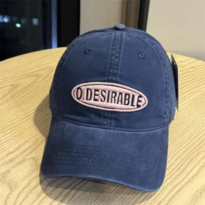 Vintage washed cotton baseball cap for women with pink embroidered letter patch, stylish dad hat.