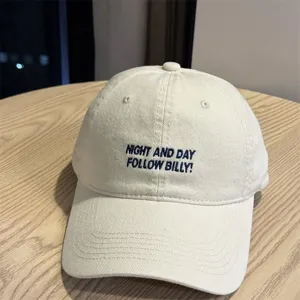 Vintage washed cotton baseball cap with embroidered letter design, casual unisex dad hat for daily wear.