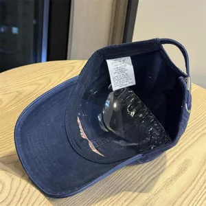 Retro washed cotton baseball cap for women, casual soft top sun hat with adjustable strap.