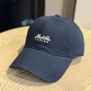 Navy blue cotton baseball cap with front embroidery, ideal for spring and summer daily wear.